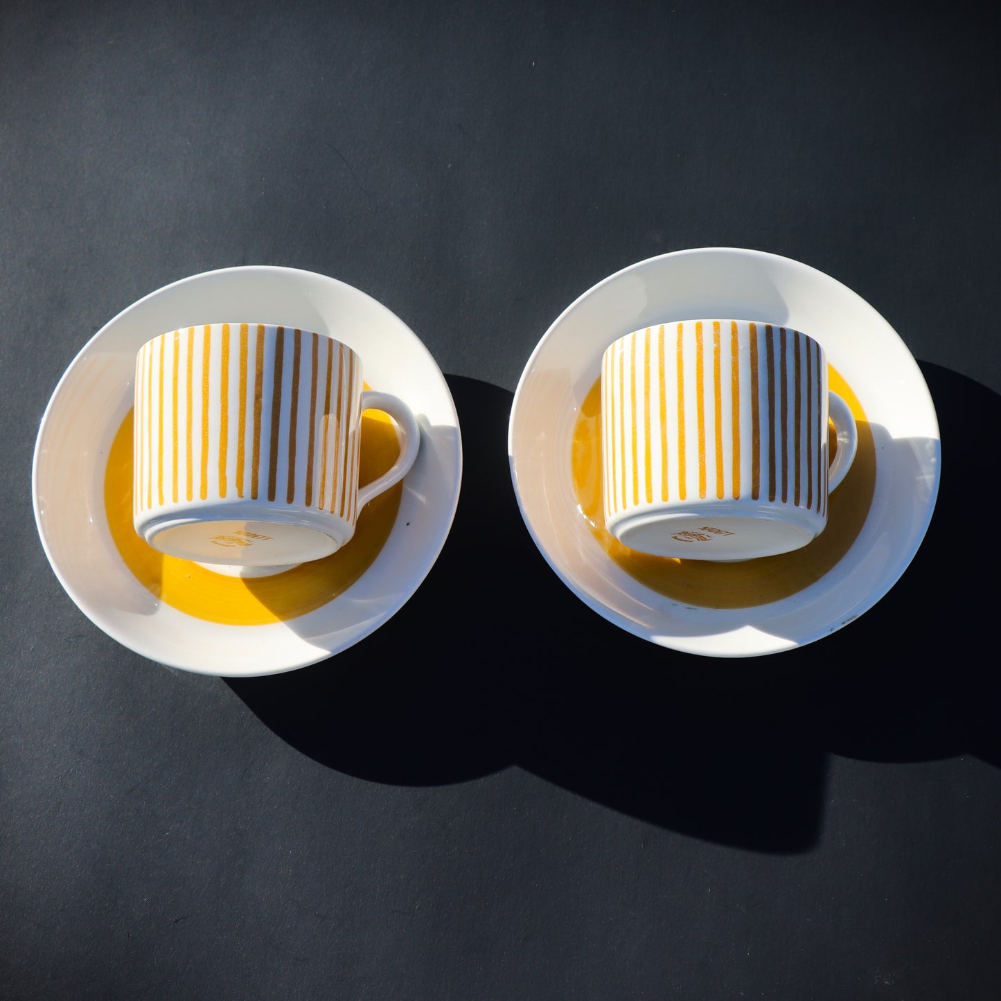 Pair of Swedish Rostrand Hertha Bengtson Kadett Mid Century Modern Yellow cups & saucers