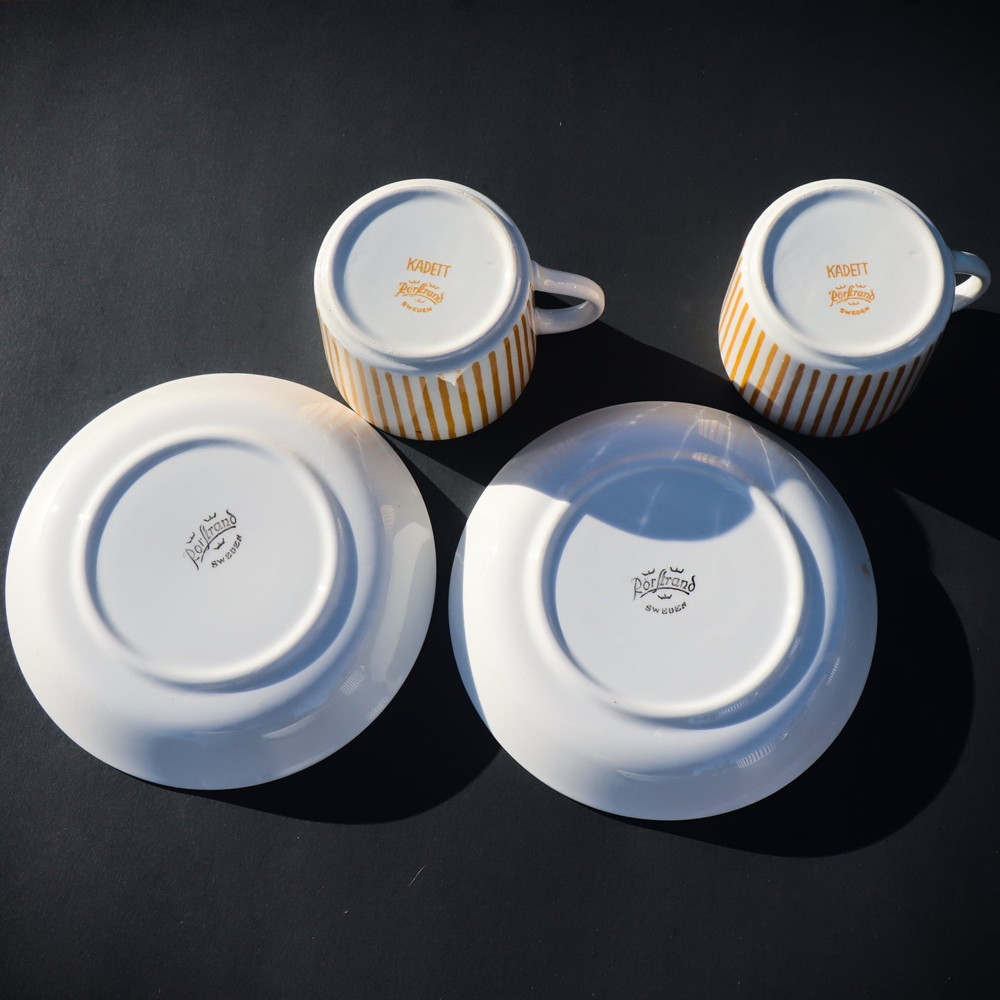 Pair of Swedish Rostrand Hertha Bengtson Kadett Mid Century Modern Yellow cups & saucers