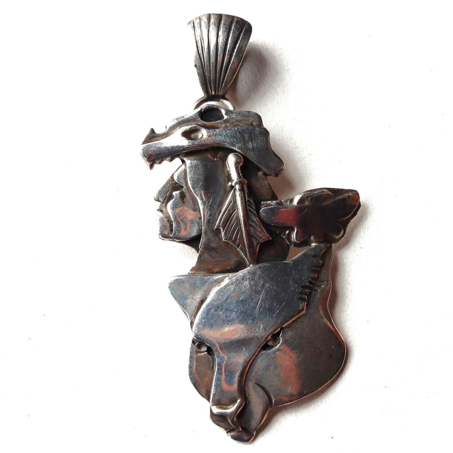 Rare signed Dan Nieto Tewa Sterling Silver Layered Wolf Totem Pendant