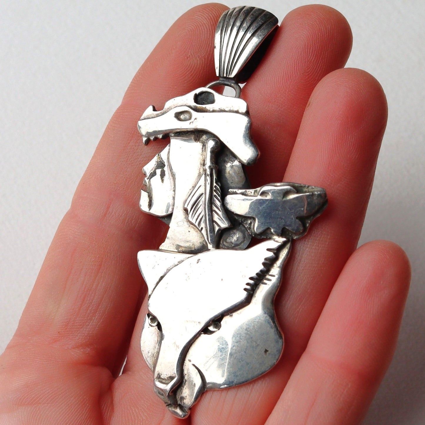 Rare signed Dan Nieto Tewa Sterling Silver Layered Wolf Totem Pendant