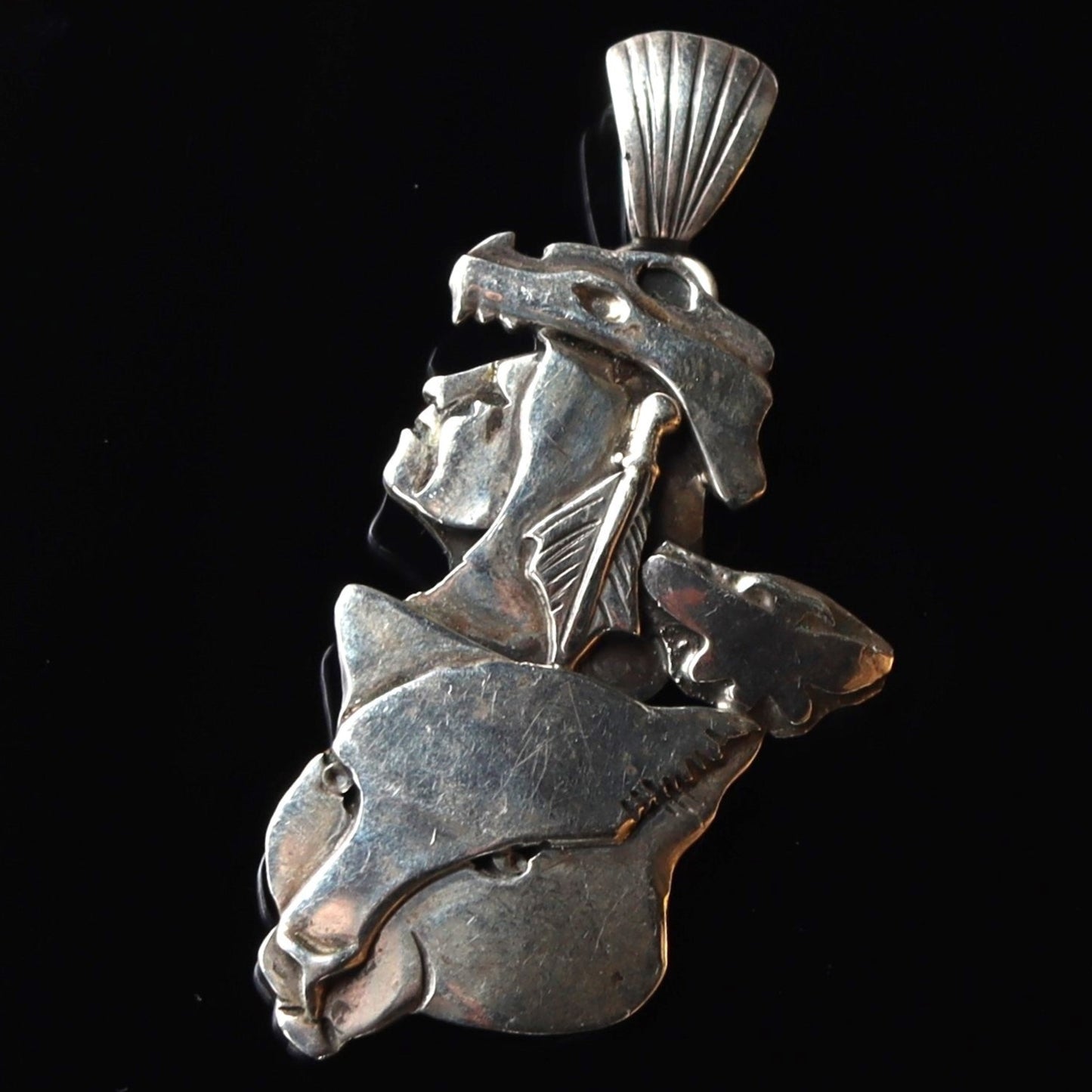 Rare signed Dan Nieto Tewa Sterling Silver Layered Wolf Totem Pendant