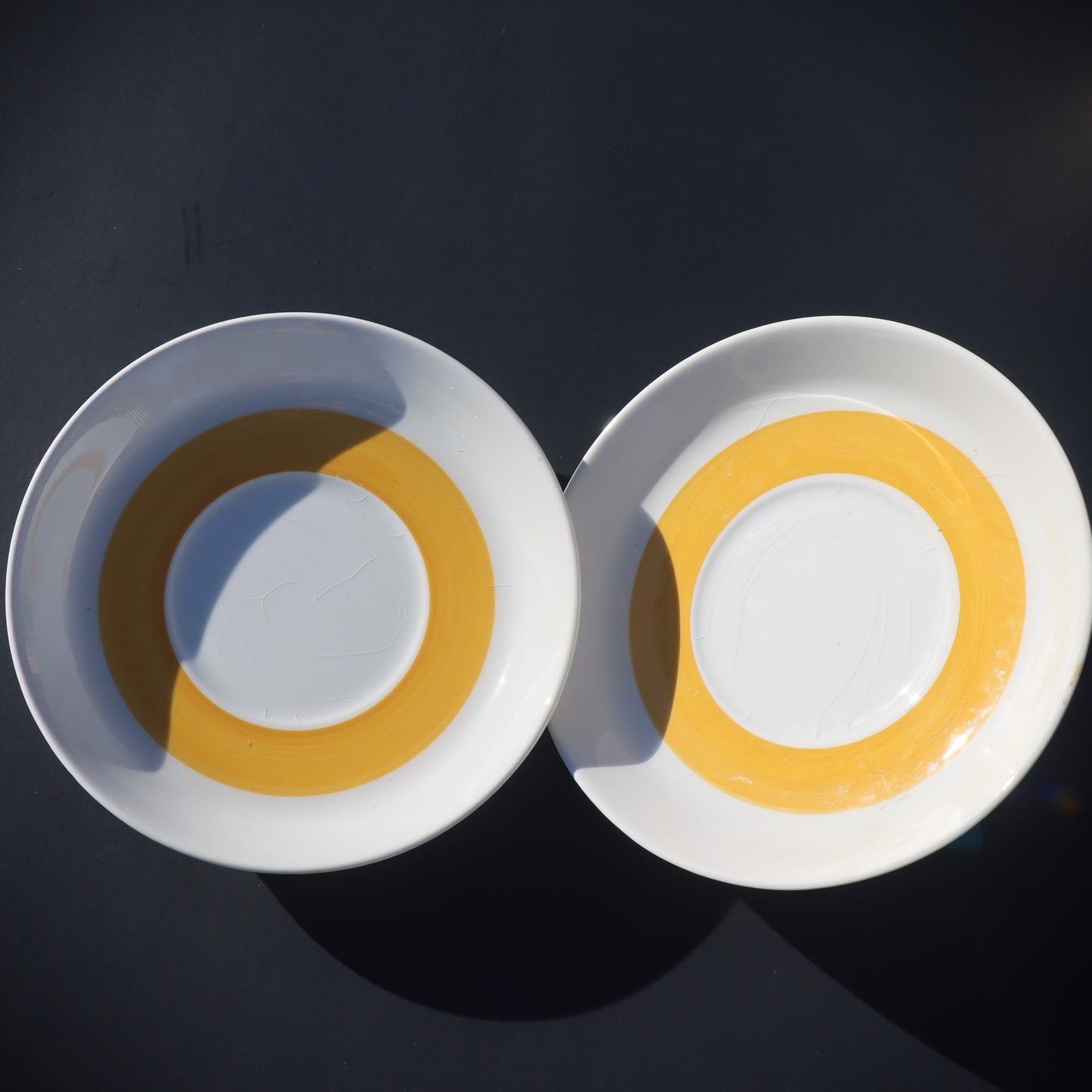 Pair of Swedish Rostrand Hertha Bengtson Kadett Mid Century Modern Yellow cups & saucers