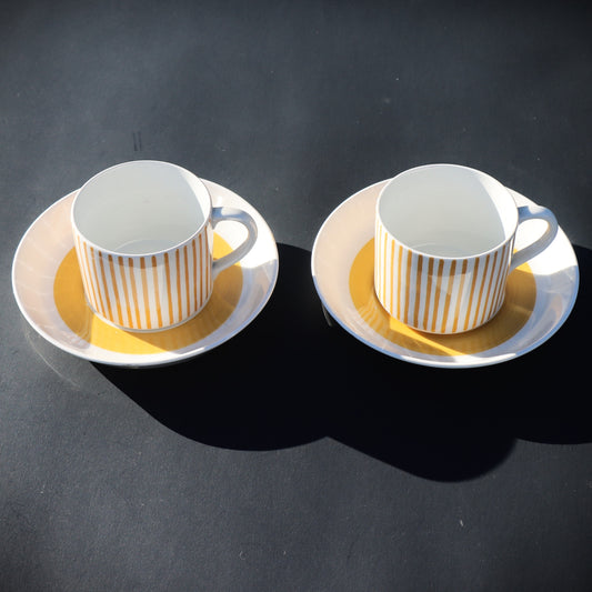 Pair of Swedish Rostrand Hertha Bengtson Kadett Mid Century Modern Yellow cups & saucers
